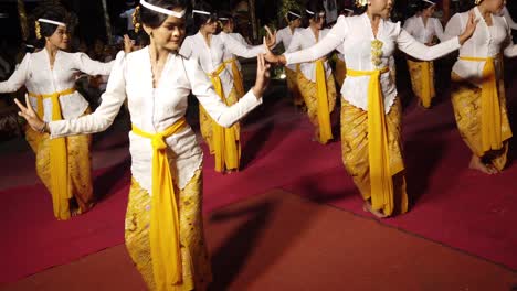 Balinese-Girls-Dancing-at-Night-Temple-Ceremony-of-Hindu-Religion-Cultural-Meeting-with-Beautiful-Traditional-Attires