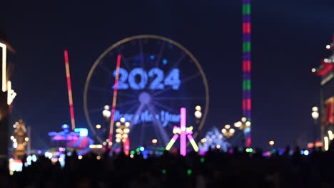 Face-Blur---New-Year-2024-celebrations-at-Global-Village-in-Dubai,-New-Year-background