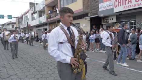 Young-brass-band-perform-street-parade-town-Independence-celebrations-slow-mo