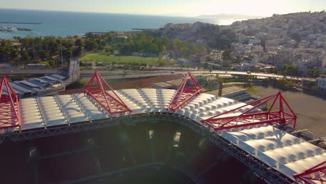 Pullback-Flight-Above-Georgios-Karaiskakis-Stadium-In-Athens,-Greece