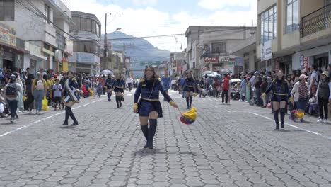 Majorettes-formation-twirl-batons-Independence-day-street-parade-slo-mo