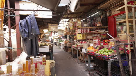 Street-Food-Vendor-Selling-Meat-at-Traditional-Market-in-Chinatown-in-Bangkok,-Thailand