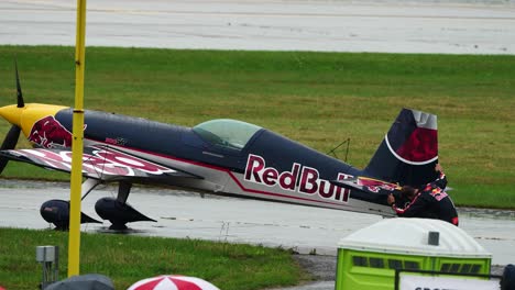 Pilot-check-plane-exterior-flight-control-wing-and-tail-during-airshow