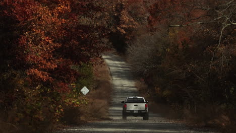 Driving-Pick-up-Truck-On-The-Country-Road-At-Lee-Creek-Park-In-Arkansas,-United-States