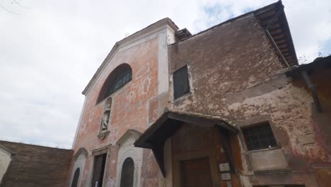 Rome-Immersive-POV:-Moving-In-Busy-Streets-to-Chiesa-Santi-Luca-e-Martina,-Italy,-Europe,-Walking,-Shaky,-4K-|-Old-Cathedral-Made-of-Stone