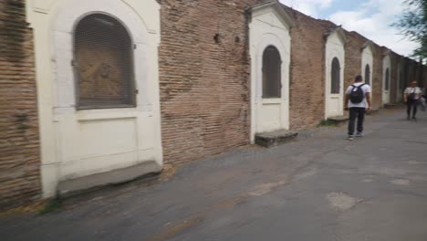 Rome-Immersive-POV:-Moving-In-Busy-Streets-to-Chiesa-Santi-Luca-e-Martina,-Italy,-Europe,-Walking,-Shaky,-4K-|-Speed-Walking-Towards-Waving-Travelers