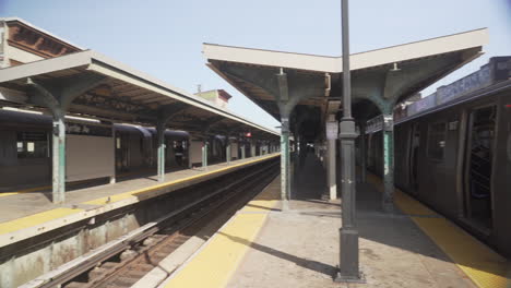 Pan-Right-on-subway-cars-leaving-the-station