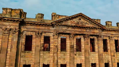 Sutton-Scarsdale-Hall-ruins-facade,-UK.-Aerial-view