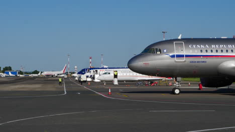 Airport-ground-crew,-jet-aircraft,-airliners,-Chișinău,-summer-day,-static