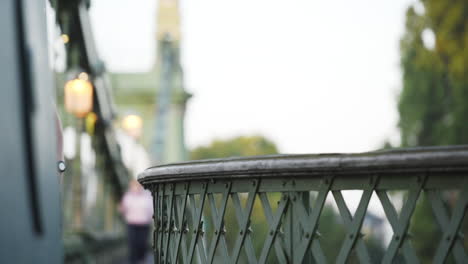 Active-Man-In-Blue-Tanks-And-Backpack-Running-At-The-Park-On-A-Sunny-Day-In-London,-UK---Slow-Motion