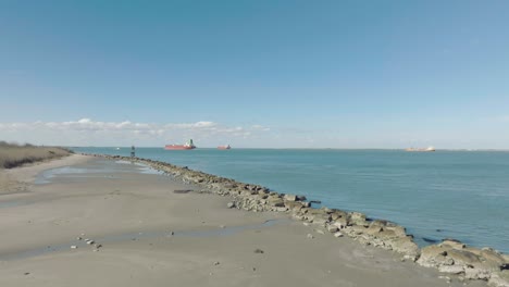 An-aerial-view-captures-tanker-ships-making-their-way-into-Galveston-Bay-as-they-travel-toward-the-Houston-Ship-Channel-in-Houston,-Texas