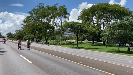 Cyclists-enjoying-Sunday-afternoon-relaxed-ride-at-the-local-city-park