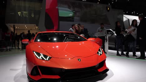 Geneva,-Switzerland---March-12th,-2019:-Medium-shot-of-a-red-Lamborghini-Huracan-Evo,-Autosalon-Geneva-Motor-Show-2019,-Switzerland