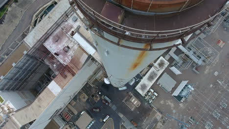 Cinematic-drone-shot-of-smokestack-at-the-NRG-Encina-Power-Plant-on-the-coast-of-Carlsbad,-CA