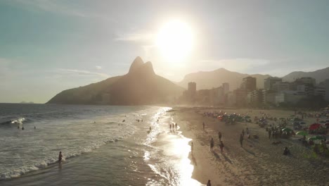 Drone-flies-backwards-above-famous-Ipanema-beach-in-Rio-de-Janeiro