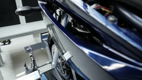 Blue-Stationary-Motorcycle-Inside-Workshop