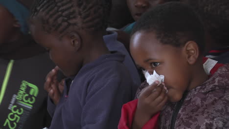 Group-of-African-kids,-boys-and-girls,-middle-shot-of-faces,-closeup