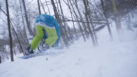 Salto-Y-Agarre-De-Snowboard,-Cámara-Lenta