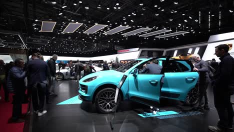 Geneva,-Switzerland---March-12th,-2019:-wide-shot-of-a-Porsche-Macan-S,-Autosalon-Geneva-Motor-Show-2019,-Switzerland