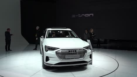 Geneva,-Switzerland--:-wide-shot-of-a-white-Audi-e-Tron-quattro,-Autosalon-Geneva-Motor-Show-,-Switzerland