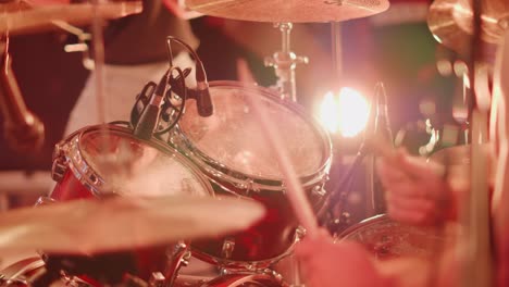 Adult-Caucasian-Male-Playing-Drums-At-The-Black-Earth-Park-In-Nyoiseau