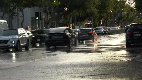 cars-travel-through-flooded-roadways