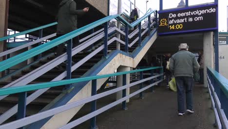 Pedestrian-Staircase-at-passenger-terminal-of-Ferry-Boat-in-Texel-Frisian-Island,-The-Netherlands---Wide-static-shot