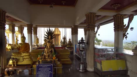 Traditional-Buddhist-Shrine-in-Thailand-Countryside,-Pull-Back-Dolly-Out-Shot