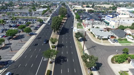 Slow-motion-aerial-drone-rising-above-Hawthorne-Blvd