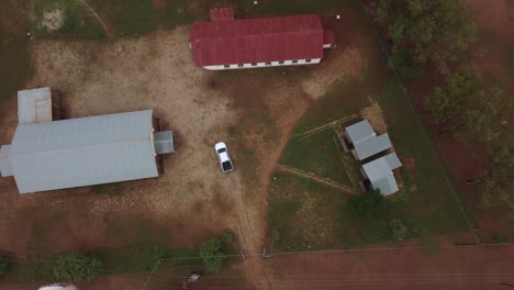 Drone-video-of-a-catholic-mission-school-church-at-a-village-in-Bulawayo,-Zimbabwe