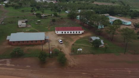 Drone-video-of-a-catholic-mission-school-church-at-a-village-in-Bulawayo,-Zimbabwe