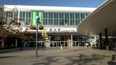 People-walking-outside-the-Toyama-Bullet-Train-Station-in-Japan