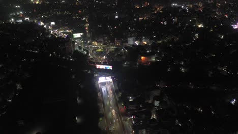 Rajkot-Aerial-Drone-View-Lots-of-vehicles-and-street-passing-by-going-towards-Racecourse-Road