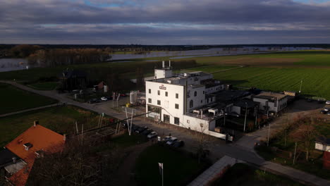 Dramatic-sunlight-fades-in-at-facade-of-famous-Dutch-beer-brewery