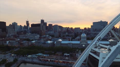 Drone-flying-past-La-Grande-Roue-gives-wide-aerial-view-of-city-skyline