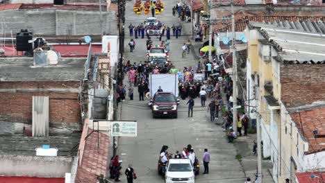 Aerial-backwards-shot-showing-People-celebrating-Mariachi-Festival-2023-in-Mexico