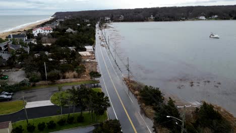 Drone-Footage-showing-the-rising-Floodwaters-waves-breach-cedar-beach-road-on-January-10th