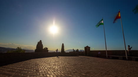 Timelapse-of-tourists-walking-around-a-high-viewpoint-in-Malaga---Spain