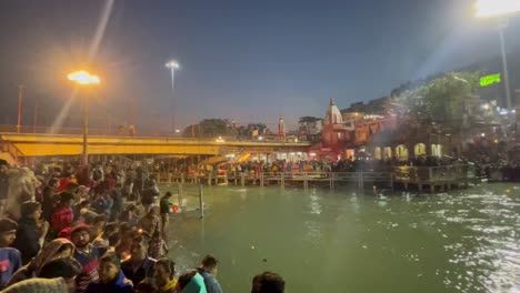 pov-shot-Many-people-are-looking-at-the-temple-and-many-people-are-doing-aarti