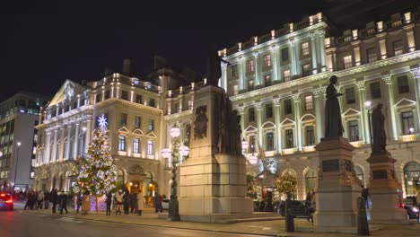 The-beautifully-illuminated-buildings-and-the-Crimean-Monument-in-London-on-Waterloo-Place