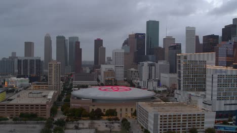 Establishing-aerial-view-of-downtown-Houston,-Texas-at-night