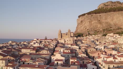 Aerial-drone-view-of-the-famous-Celafu-medieval-old-town-in-Sicily,-Italy