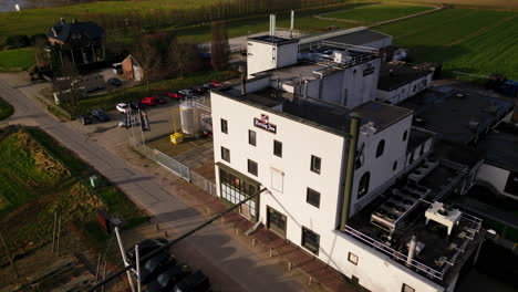 Hertog-Jan-beer-brewery-white-front-facade-architecture-of-factory-building