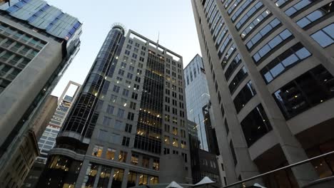 Colour-Changing-Fountains-Of-Australia-Square-Tilt-Up-View-To-Show-Sydney-Skyscrapers