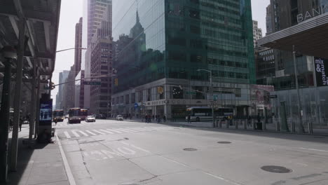 Empty-6th-ave-at-42nd-Street-with-reflection-of-Empire-State-Building