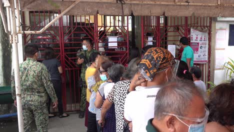 Senior-Filipino-Citizens-queue-for-Corona-Virus-vaccinations-for-up-to-12-hours-in-Surigao-City-Philippines