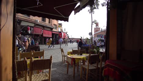 Marrakesh,-Morroco,-People-at-Square-in-Front-of-Traditional-Coffee-Shop