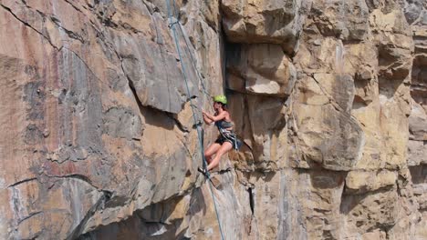 Happy-Smiling-Rock-Climber-Drops-Chalk-Bag