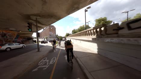 POV-Cycling-Along-Saint-Laurent-Boulevard-Under-Boulevard-Rosemont-In-Montreal