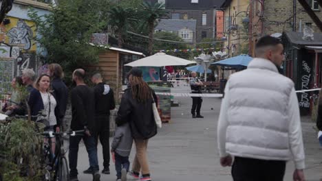 Police-close-Christiania-street,-slow-motion-rack-focus